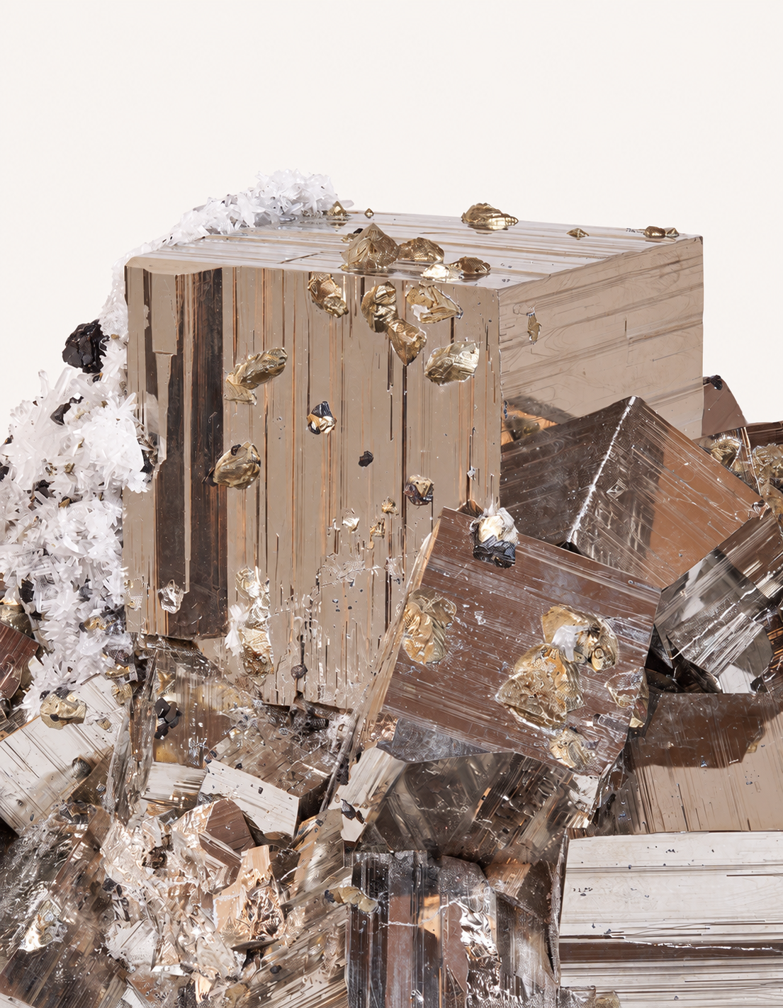 A close-up studio shot of a mineral specimen with a large metallic brown cube surrounded by jagged crystalline fragments and small gold-toned inclusions, set against a plain light gray background.