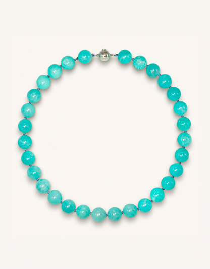 A 16-inch Natural Amazonite Choker featuring polished 12mm sea-foam green and blue beads with unique natural striations.