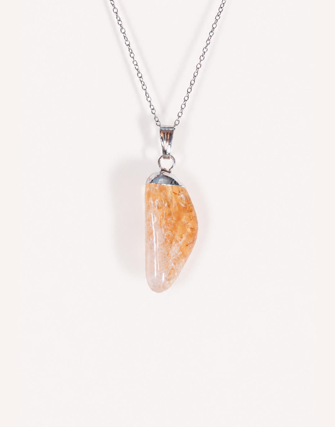 Natural polished heat-treated citrine pendant in vibrant golden amber on a complimentary 18-inch stainless steel chain.