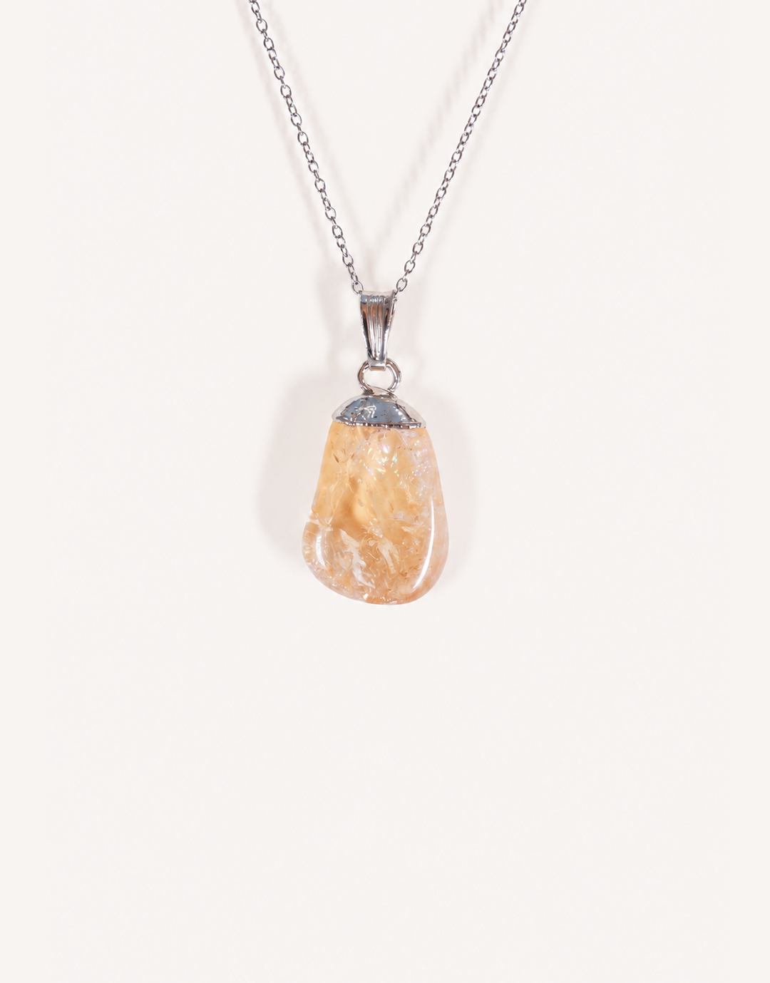 Natural polished heat-treated citrine pendant in vibrant golden amber on a complimentary 18-inch stainless steel chain.