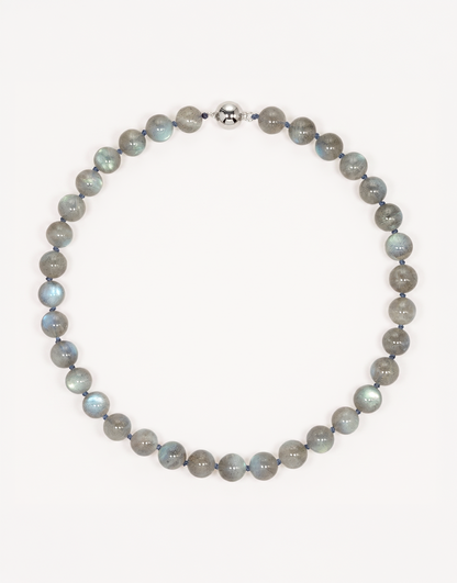 A 16-inch Natural Labradorite Necklace showcasing smooth 10mm charcoal-grey beads with iridescent blue and green labradorescence.