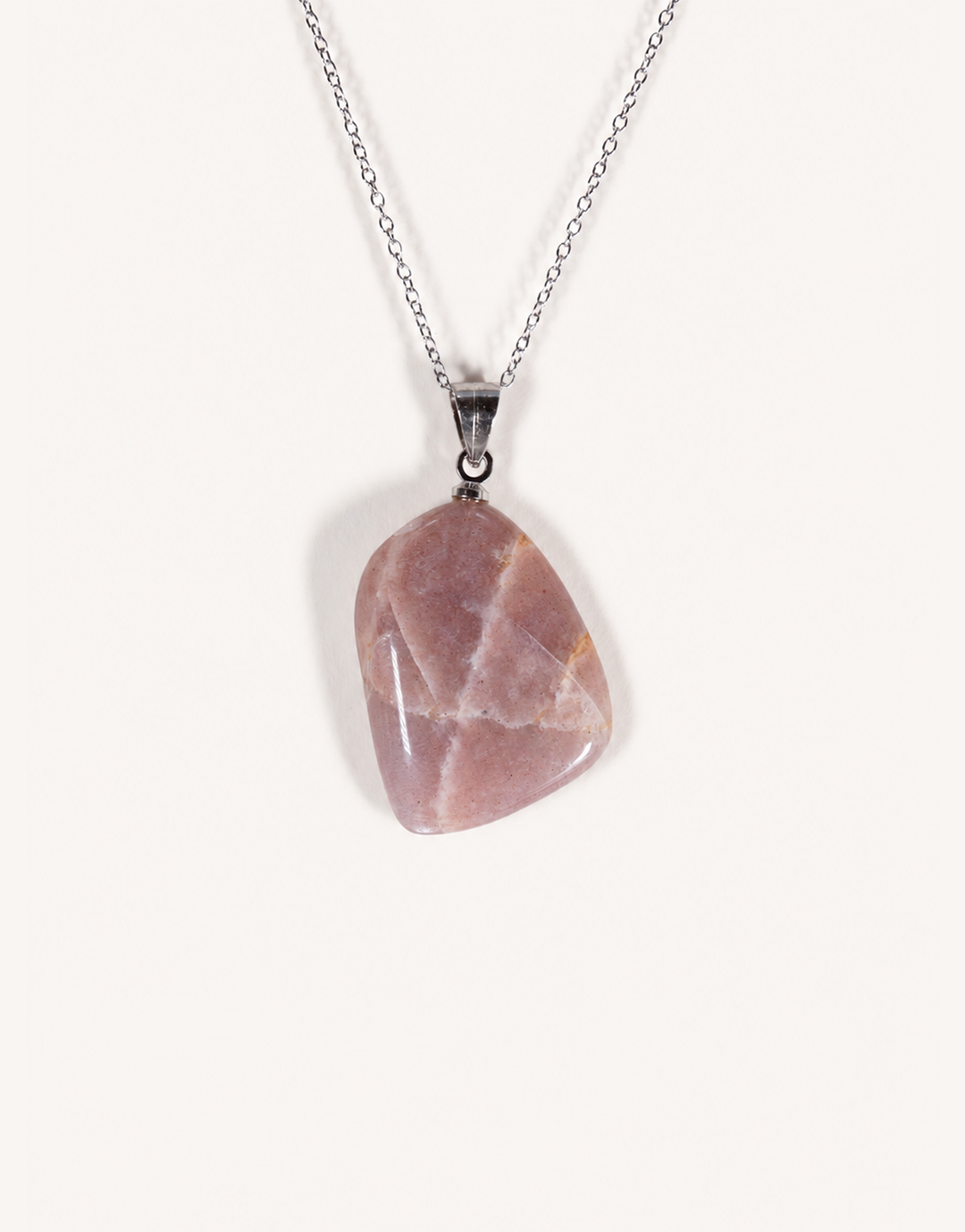 A Natural Peach Moonstone Pendant featuring smooth apricot and dusty-rose tones with a soft sheen on an 18-inch stainless steel chain.