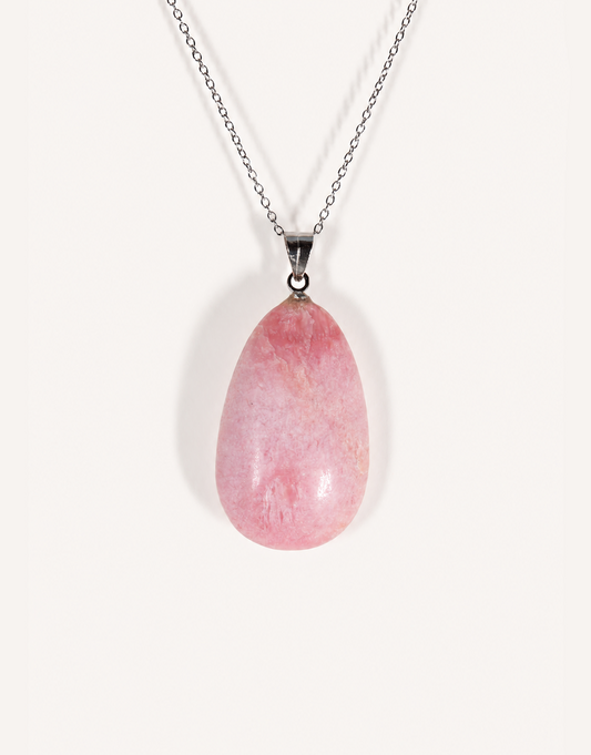 A Natural Pink Opal Pendant featuring smooth pastel pink and ivory hues on an 18-inch stainless steel chain.