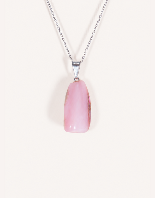 A Natural Pink Opal Pendant featuring a smooth pastel pink tumbled stone on an 18-inch stainless steel chain.