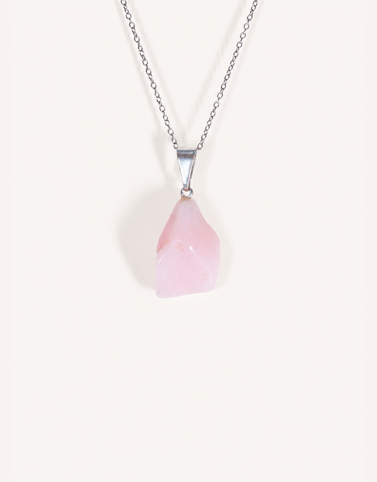 A Natural Pink Opal Pendant featuring a smooth pastel pink tumbled stone on an 18-inch stainless steel chain.