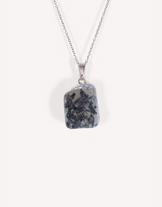 A Natural Prehnite Pendant featuring a smooth translucent light green tumbled stone on an 18-inch stainless steel chain.