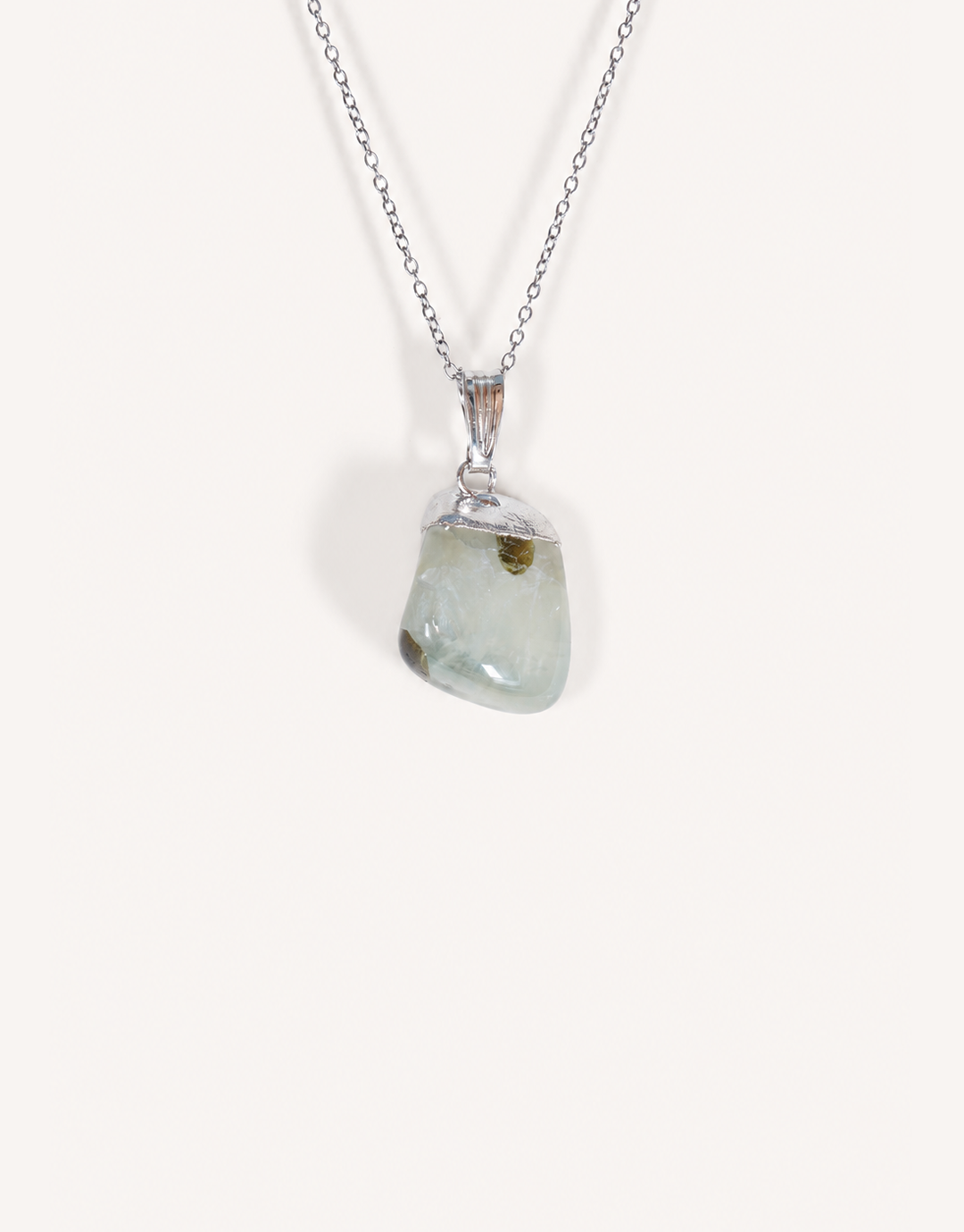 A Natural Prehnite Pendant featuring a smooth translucent light green tumbled stone on an 18-inch stainless steel chain.