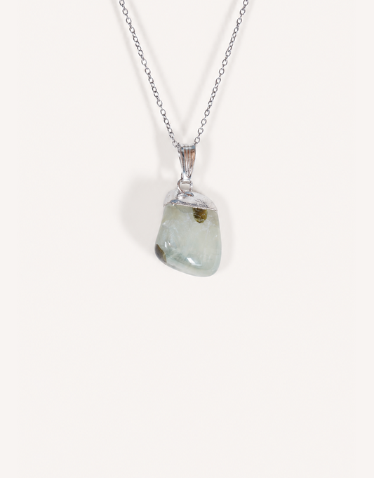 A Natural Prehnite Pendant featuring a smooth translucent light green tumbled stone on an 18-inch stainless steel chain.