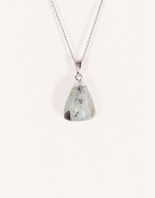 A Natural Prehnite Pendant featuring a smooth translucent light green tumbled stone on an 18-inch stainless steel chain.