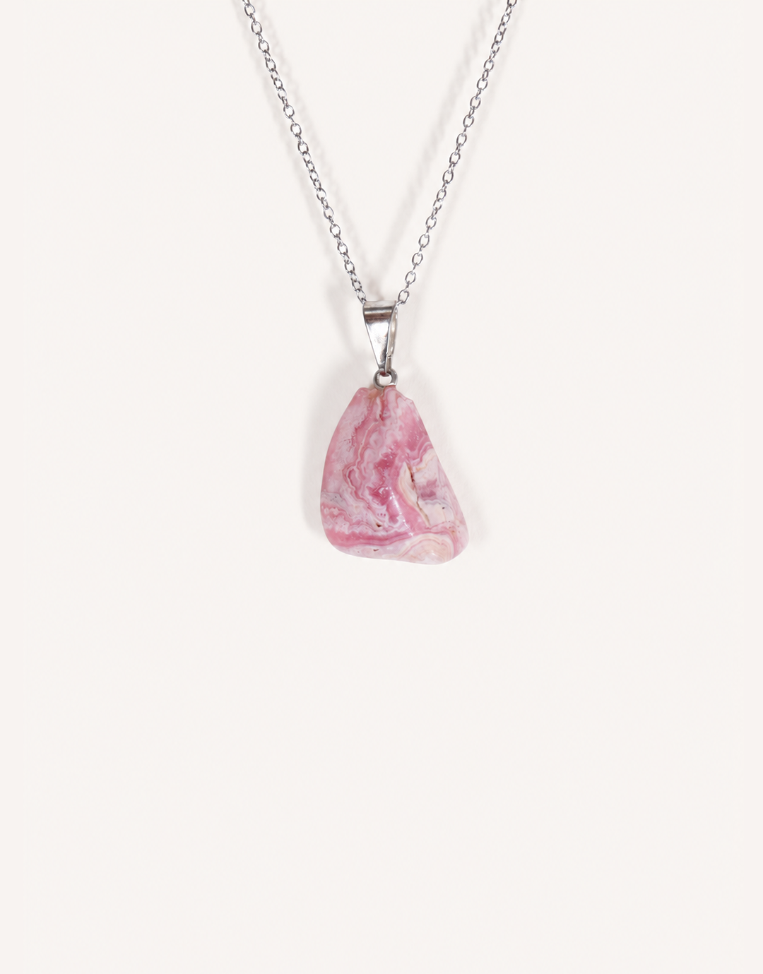 A Natural Rhodochrosite Pendant featuring a smooth pink stone with white banded ribbons on an 18-inch stainless steel chain.