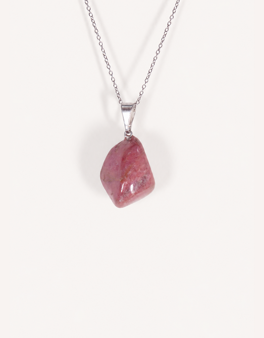 A Natural Rhodonite Pendant featuring a smooth dusty-rose stone with black manganese matrix veins on an 18-inch stainless steel chain.
