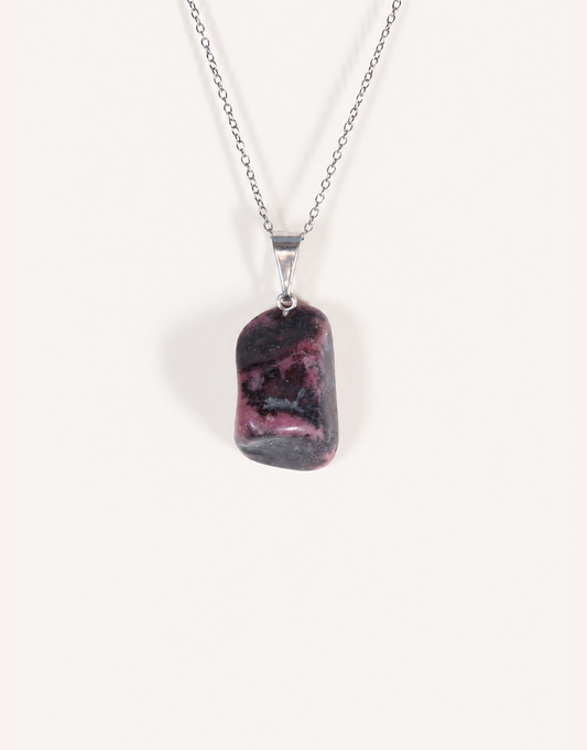 A Natural Rhodonite Pendant featuring a smooth dusty-rose stone with black manganese matrix veins on an 18-inch stainless steel chain.