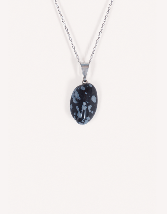 Natural polished snowflake obsidian pendant in jet black with white crystalline patterns on a complimentary 18-inch stainless steel chain.