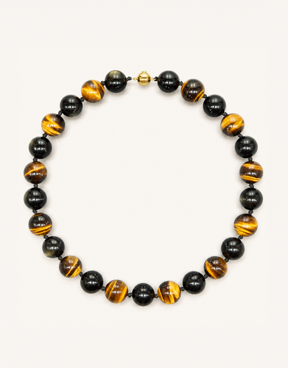 A 16-inch Natural Silver Sheen Obsidian and Tiger's Eye Necklace featuring 16mm polished beads with silver metallic flash and golden chatoyant bands.
