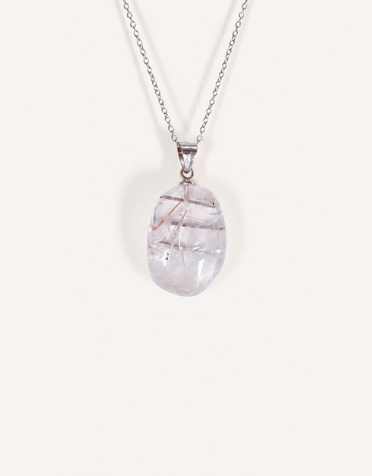 A Natural Tourmalinated Quartz Pendant showcasing clear quartz with black tourmaline needle inclusions on an 18-inch stainless steel chain.
