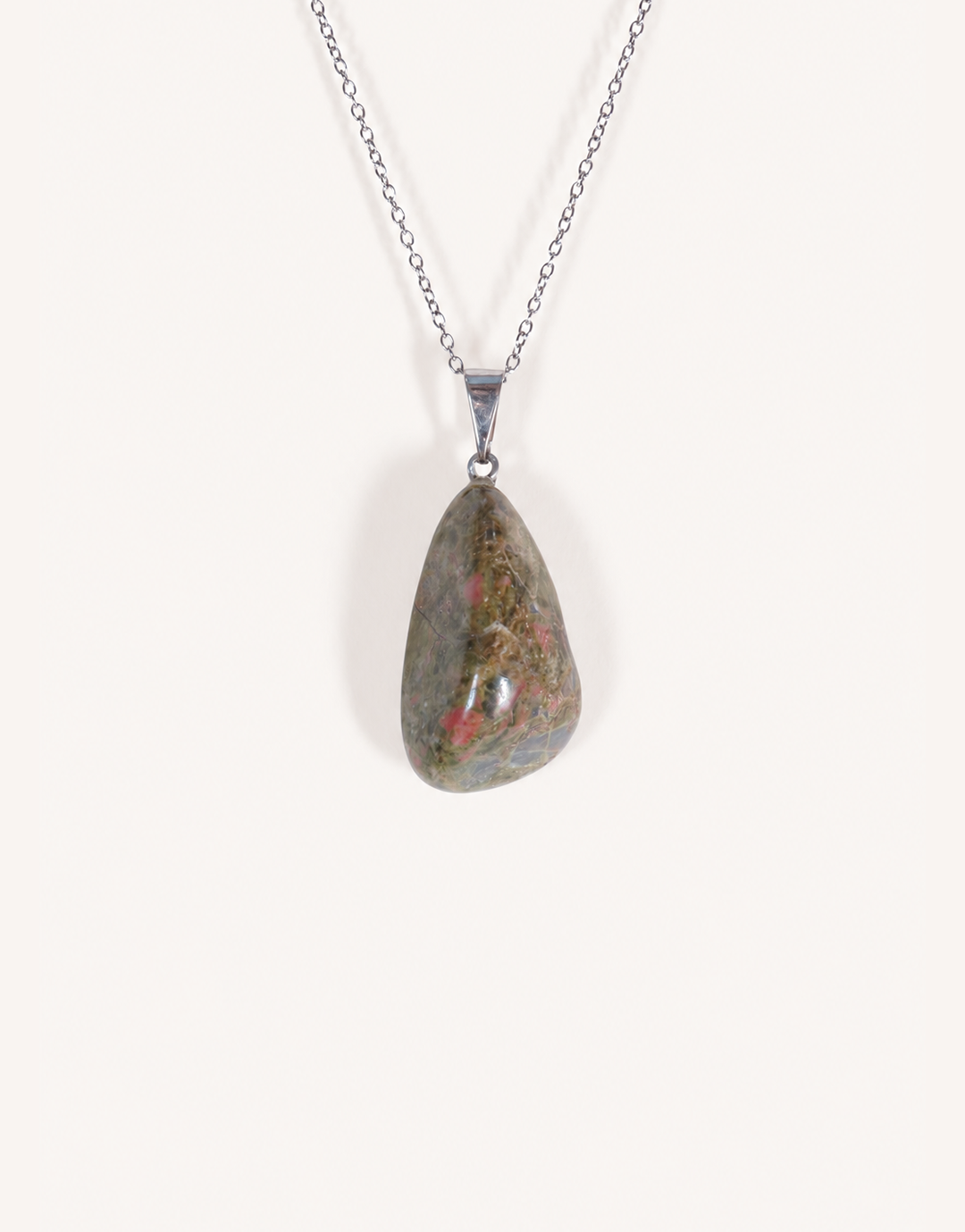 A Natural Unakite Pendant featuring a smooth green and coral-pink tumbled stone on an 18-inch stainless steel chain.