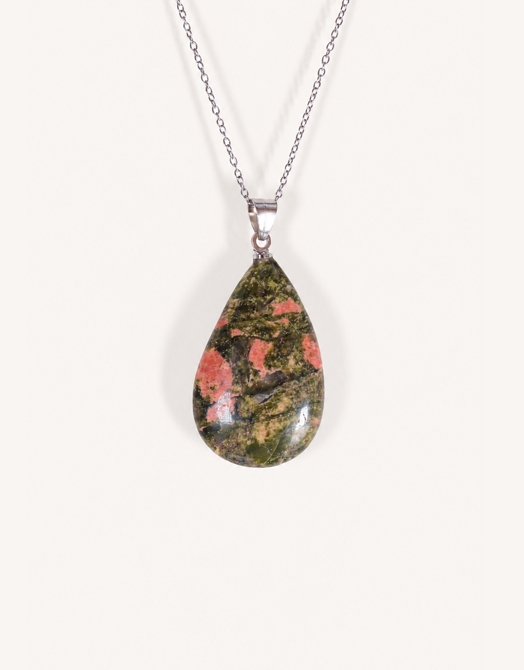 A Natural Unakite Pendant featuring a smooth green and coral-pink tumbled stone on an 18-inch stainless steel chain.
