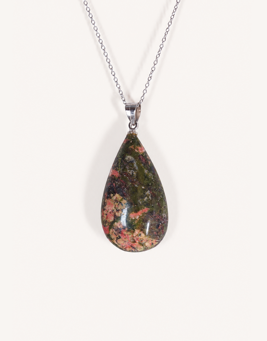 A Natural Unakite Pendant featuring a smooth green and coral-pink tumbled stone on an 18-inch stainless steel chain.